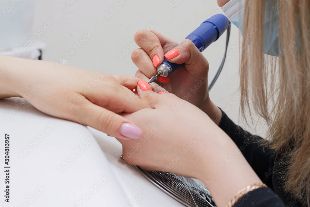 The process of cleaning the nail from the old coating and giving it the desired shape. The process of cleaning the nail from the old coating and giving it the desired shape.