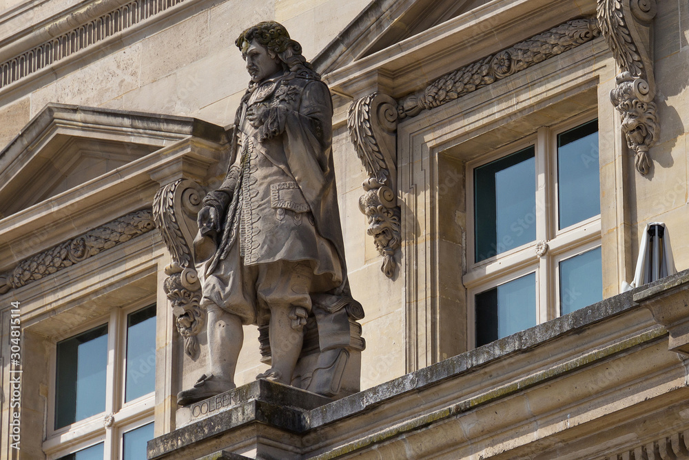 Jean-Baptiste Colbert (1619-1683) statue on the Louvre Palace, Paris, France. He was a French politician who served as the Minister of Finances of France 1661-1683 under the rule of King Louis XIV.