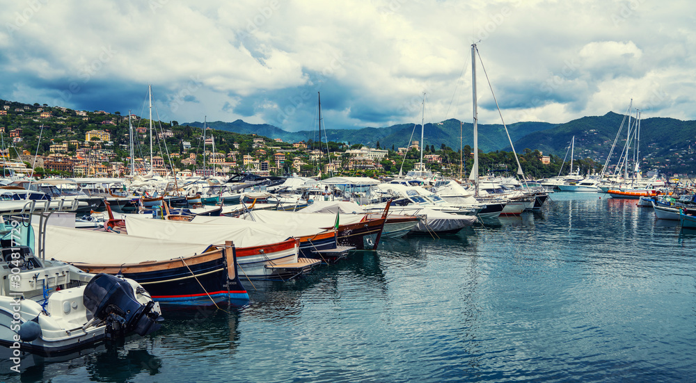 Fototapeta premium Fantastic summer vacation destination, superb Santa Margareta Luguria mediterranean cityscape with colorful buildings and boats, yachts in the bay. Italy, Europe.
