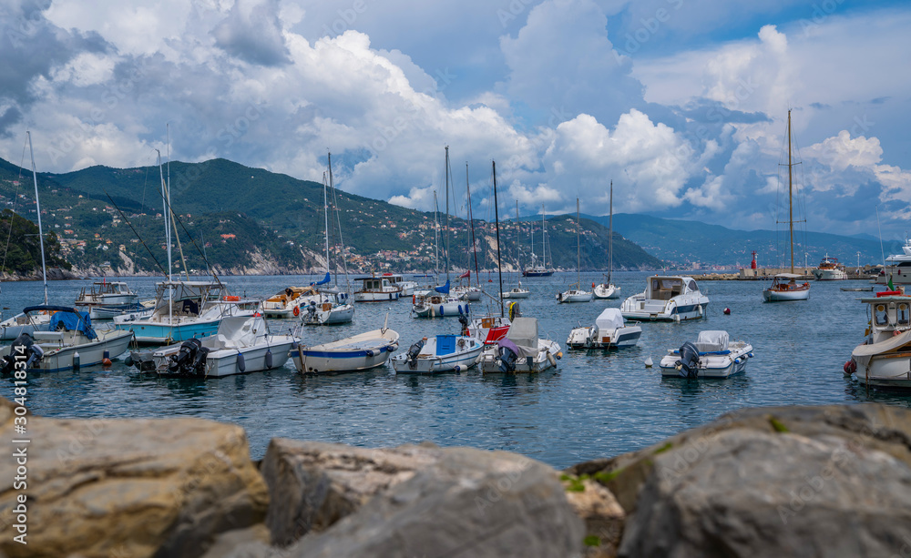 Fantastic summer vacation destination, superb Santa Margareta Luguria mediterranean cityscape with colorful buildings and boats, yachts in the bay. Italy, Europe.
