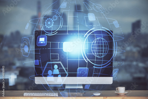 Computer on desktop with social network theme icon. Multi exposure. Concept of international connections.