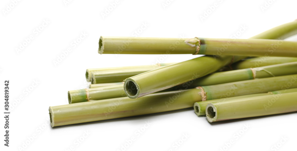 Fototapeta premium Green bamboo sticks isolated on white background, side view