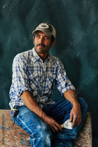 Studio portrait of construction worker