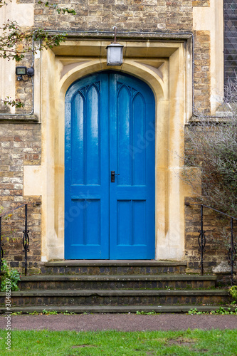 Blue wooden church door © nowyn