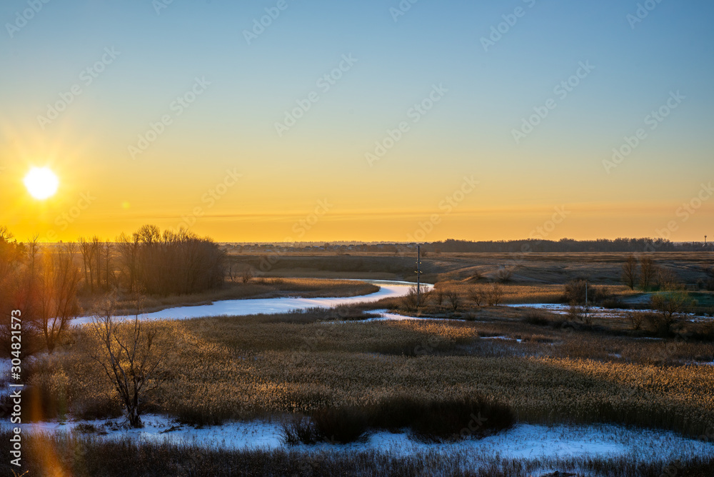 Graceful bends of the river at sunrise