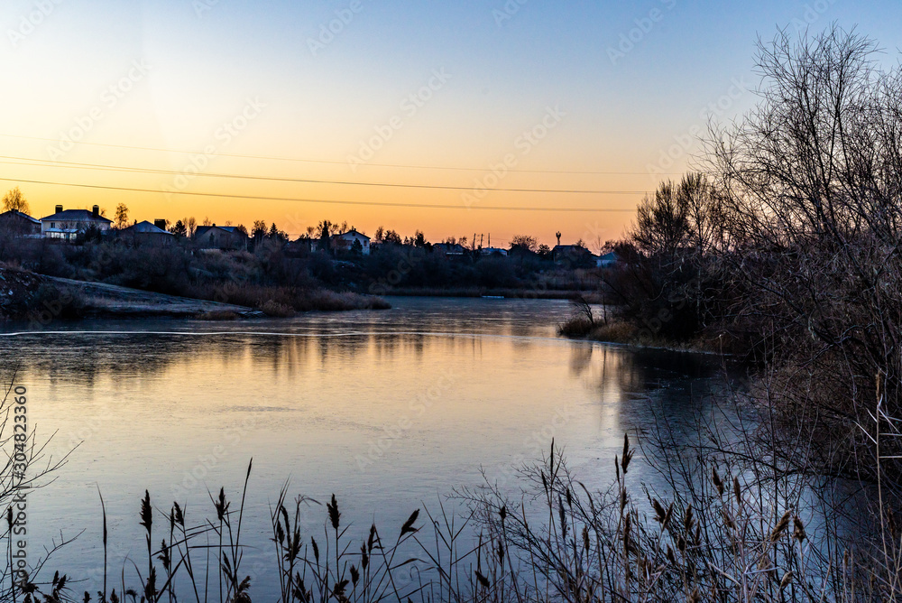A frozen lake photographed in the early morning