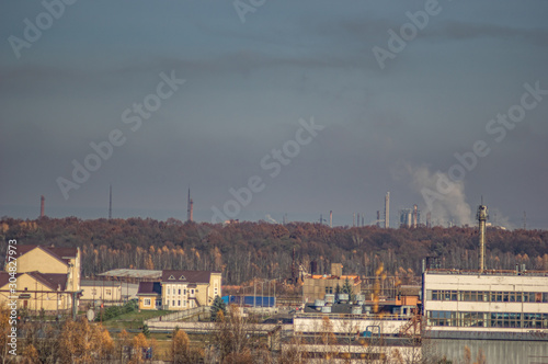 Factories in an industrial area among the forest © onyx124