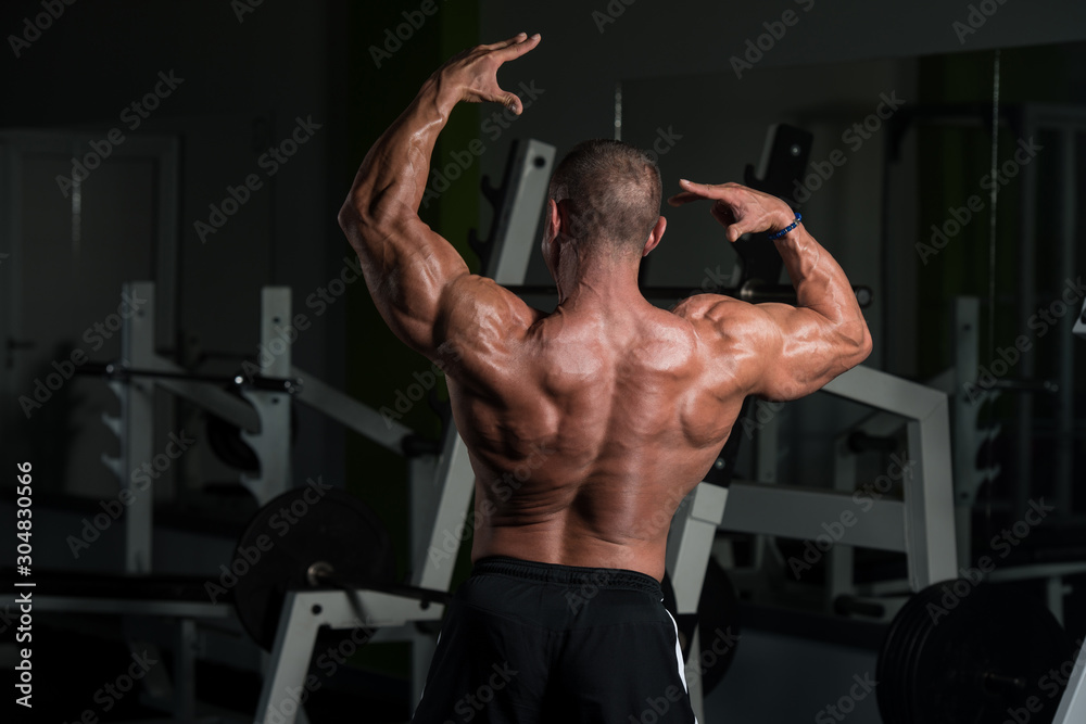 Mature Bodybuilder Posing Biceps After Exercises Stock Photo | Adobe Stock