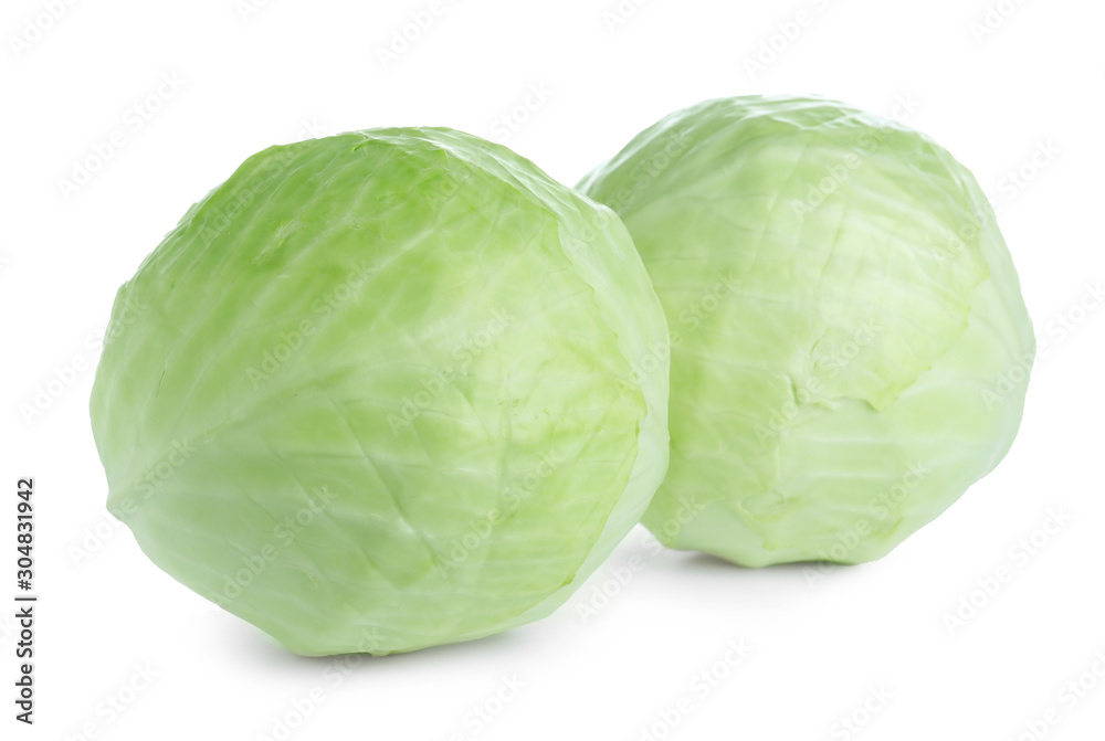Whole fresh ripe cabbages isolated on white Whole fresh ripe cabbages isolated on white