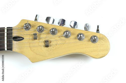 Fotografija six-string electric guitar neck isolated on white background