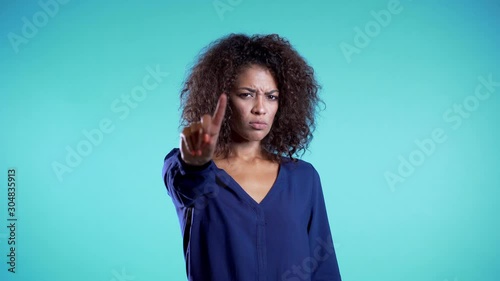 Business woman disapproving with No Hand Sign Make Negation Finger Gesture. Denying, Rejecting, Disagree, Portrait of Beautiful African Gir