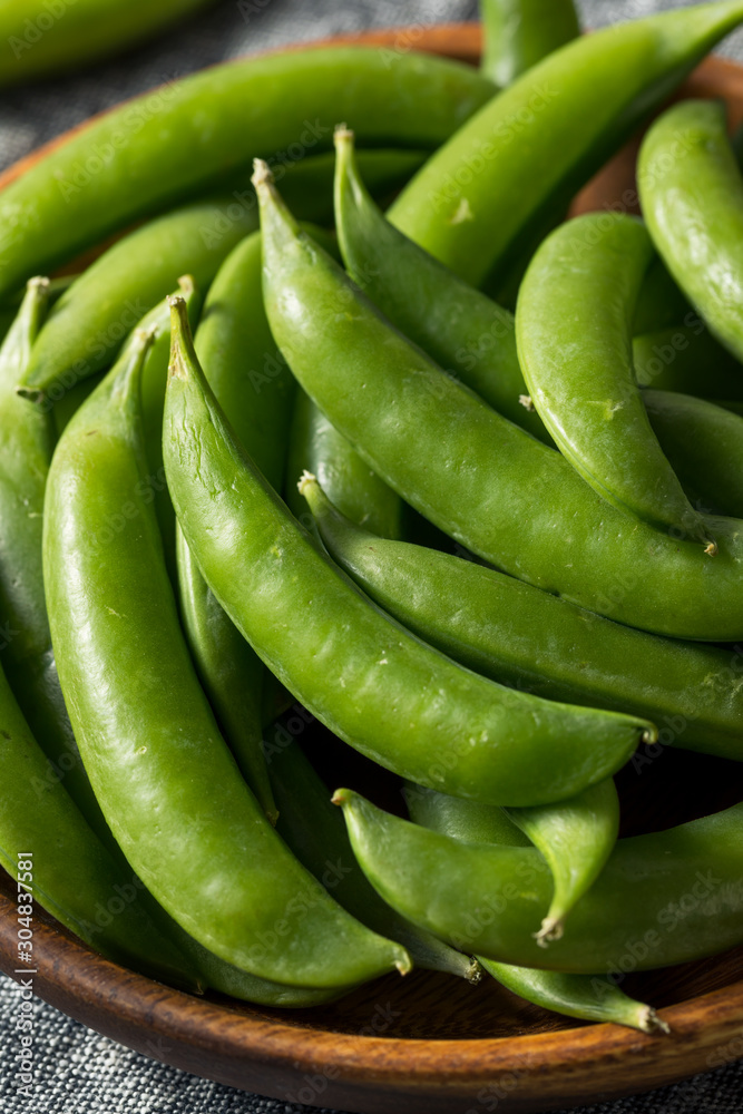 Raw Green Organic Sugar Snap Peas Raw Green Organic Sugar Snap Peas
