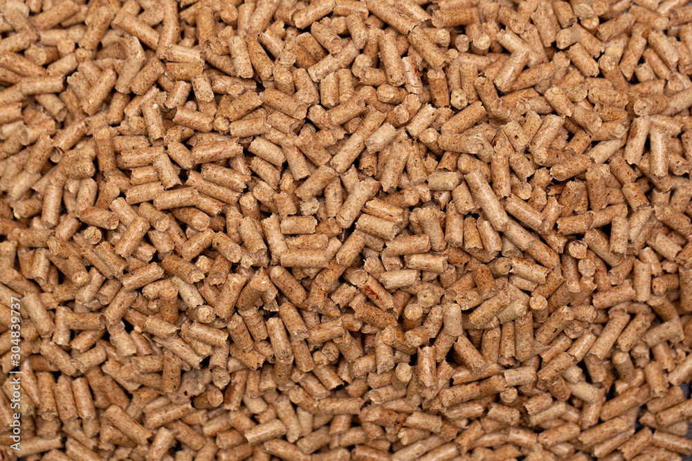 Abstract background in the form of wooden pressed cylinders close-up. Abstract background in the form of wooden pressed cylinders close-up.