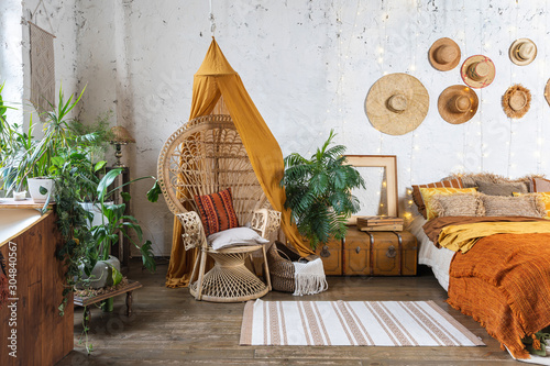 Cozy house with room in boho style interior photo