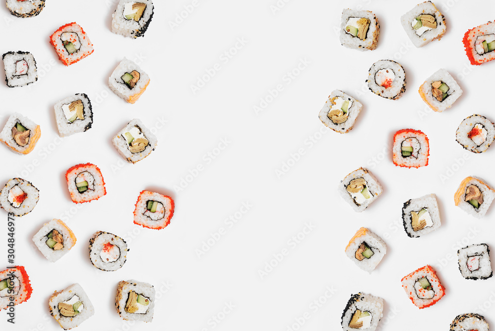 Obraz premium Japanese rolls on hite background.