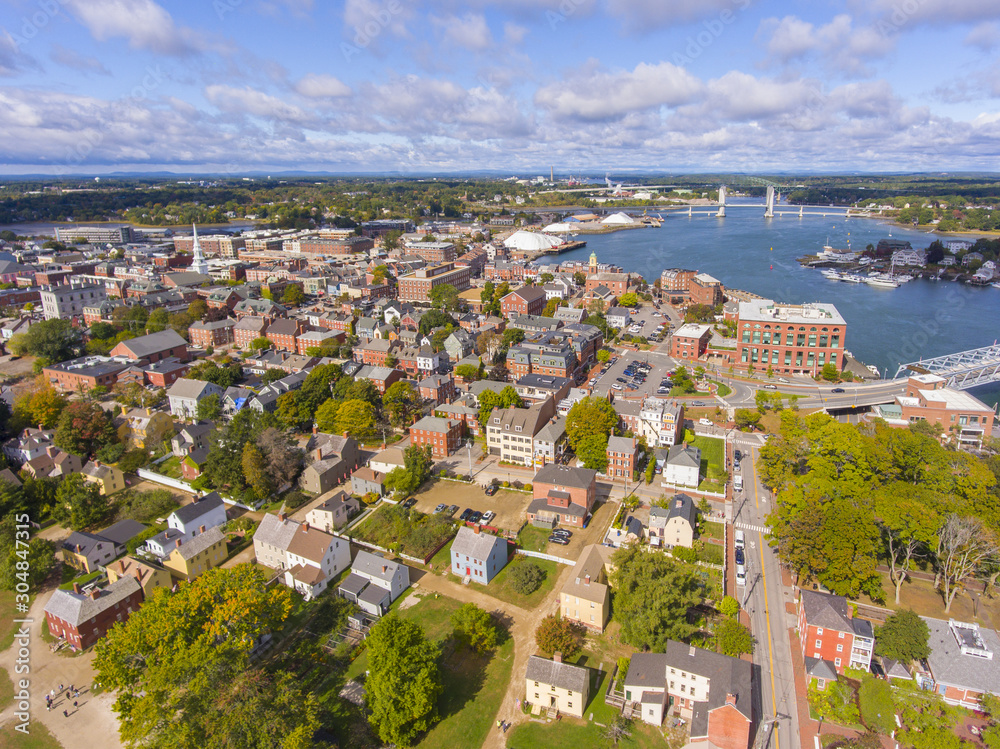 Portsmouth historic city center and Waterfront of Piscataqua River with Memorial Bridge aerial view, New Hampshire, NH, USA.