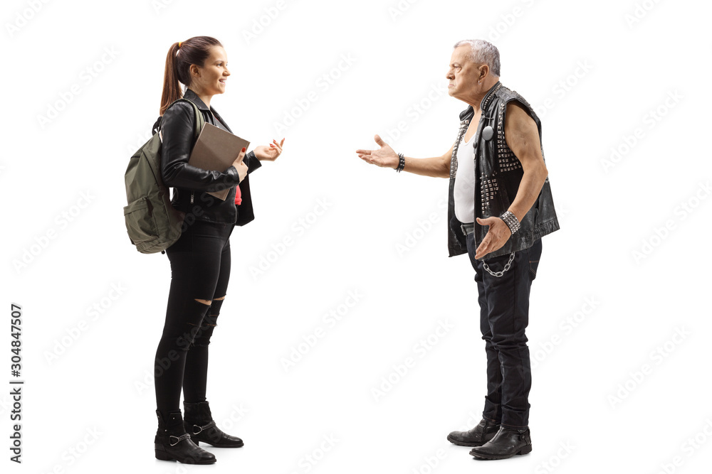Angry mature punk talking to a young female student Angry mature punk talking to a young female student