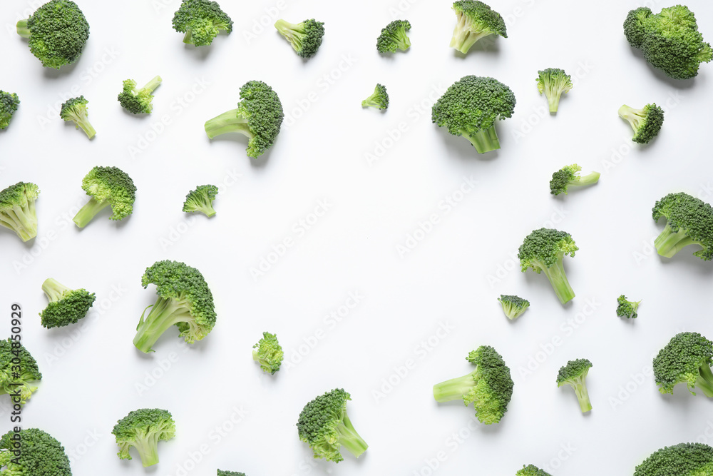 Fresh tasty broccoli on white background, top view Fresh tasty broccoli on white background, top view