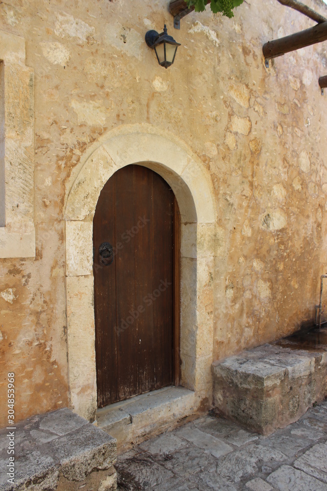 Old door in Arkadi Monastery Rethymnon, Crete, Greece