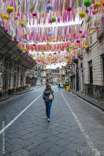 Paper flowers on Vittorio Emanuele II Street in Acireale city on Sicily Island, Italy photo