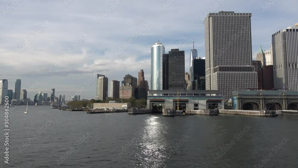 4K. Ultra HD. Tall buildings of New York seen from the river. Skyline close-up to the Manhattan skyline, New York. Of the most tourist cities. United States of America. Travel concepts. 4K. Ultra HD. Tall buildings of New York seen from the river. Skyline close-up to the Manhattan skyline, New York. Of the most tourist cities. United States of America. Travel concepts.