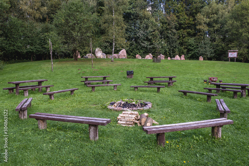 Rest area with lapidarium in Landscape Park of Dylewo Hills near Ostroda town in Poland photo