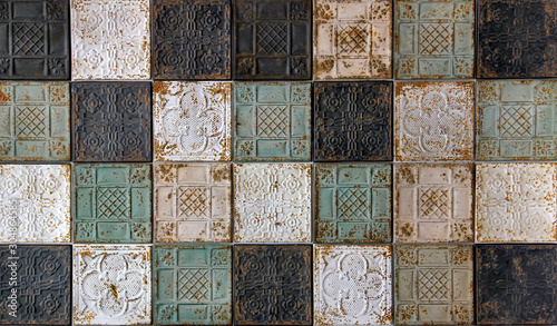 Rustic looking pressed tin antique ceiling tiles with oriental pattern, a beautiful background