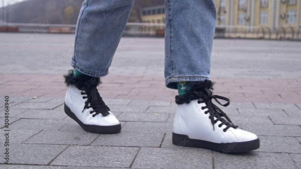 Girl in White Winter Shoes with black sole and laces Girl in White Winter Shoes with black sole and laces