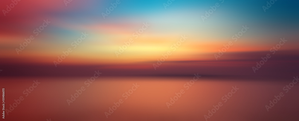 Motion blurred background of sunset on the sea