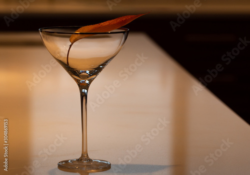 Orange Fall Leaf in empty, beautiful cocktail glass