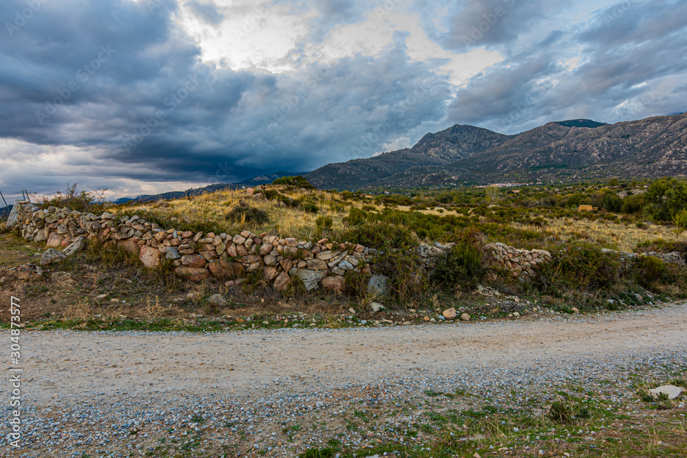 Rural road in Guadarrama sierra. madrid Spain