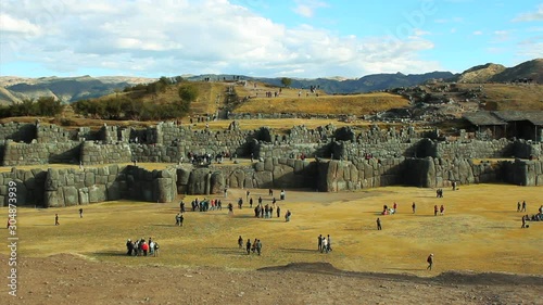 Saqsaywaman - Sacred Valley, Peru -  Tourists visiting Inca ruins and temples photo