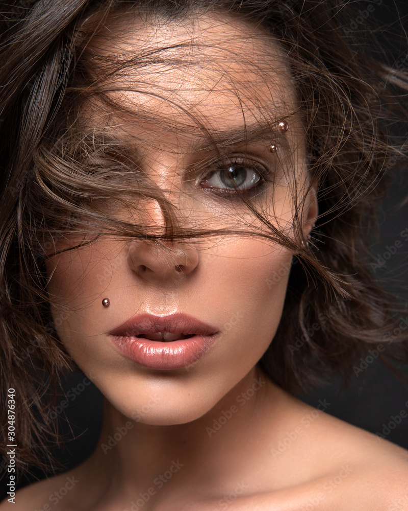 beauty portrait of gorgeous female with blowing hair beauty portrait of gorgeous female with blowing hair