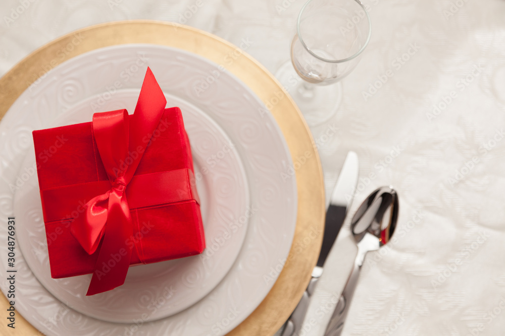 Christmas Gift with Place Setting at Table Christmas Gift with Place Setting at Table
