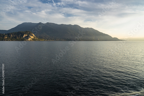 Scenic view of the Lake Maggiore at sunset on ferry boat cruising Luino to Stresa  Piedmont  Italy