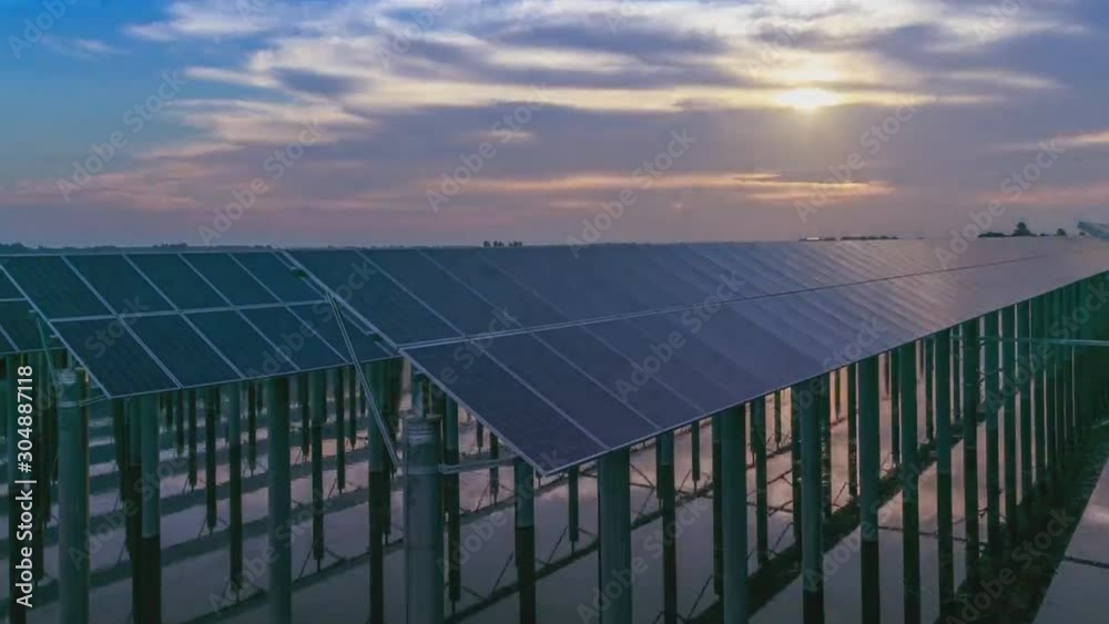 view of solar panels. A solar power station is located near the city of Huainan in Anhui Province, China. (time-lapse)