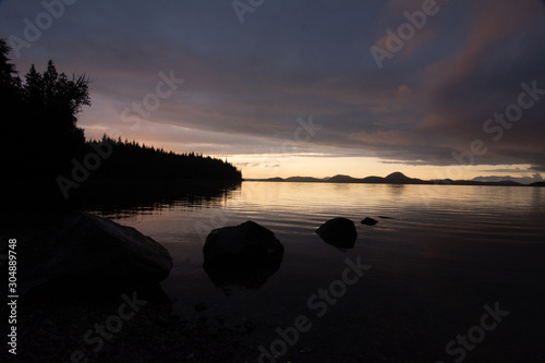 dark clouds over kennedy lake on vancouver island photo