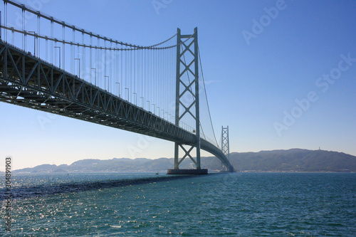 Fototapeta Naklejka Na Ścianę i Meble -  Akashi Kaikyo Bridge the longest suspension bridge in the world at Kobe, Japan.