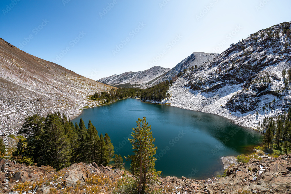USA, California, Mono County, Virginia Lakes. Blue Lake, a tear drop shaped alpine lake with brillant emerald color in the Eastern Sierra Nevada Mountains near Bridgeport.