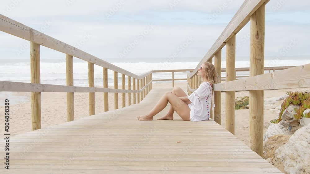 Beautiful woman at the beach - typical view - travel photography Beautiful woman at the beach - typical view - travel photography