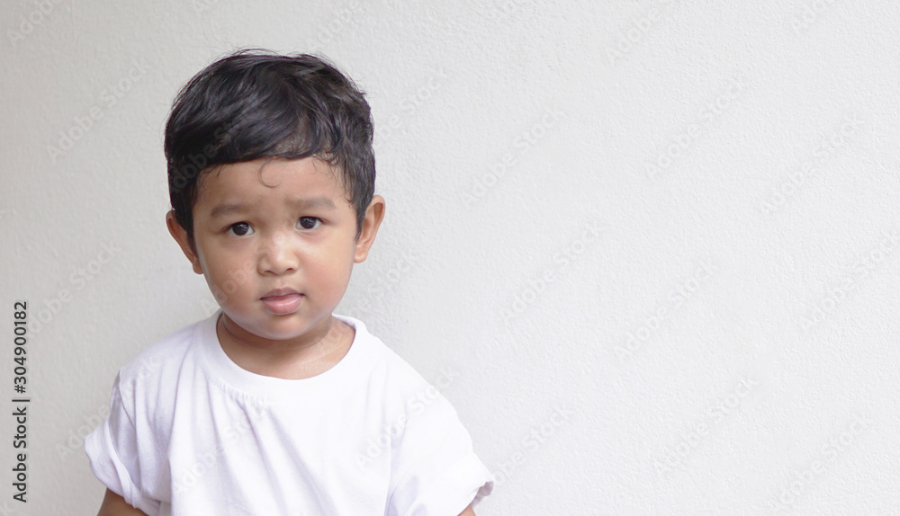 Asian kid 2 year old. Imagination his graduated day with hand drawn graduate dress on white background, education and graduation concept idea. Asian kid 2 year old. Imagination his graduated day with hand drawn graduate dress on white background, education and graduation concept idea.