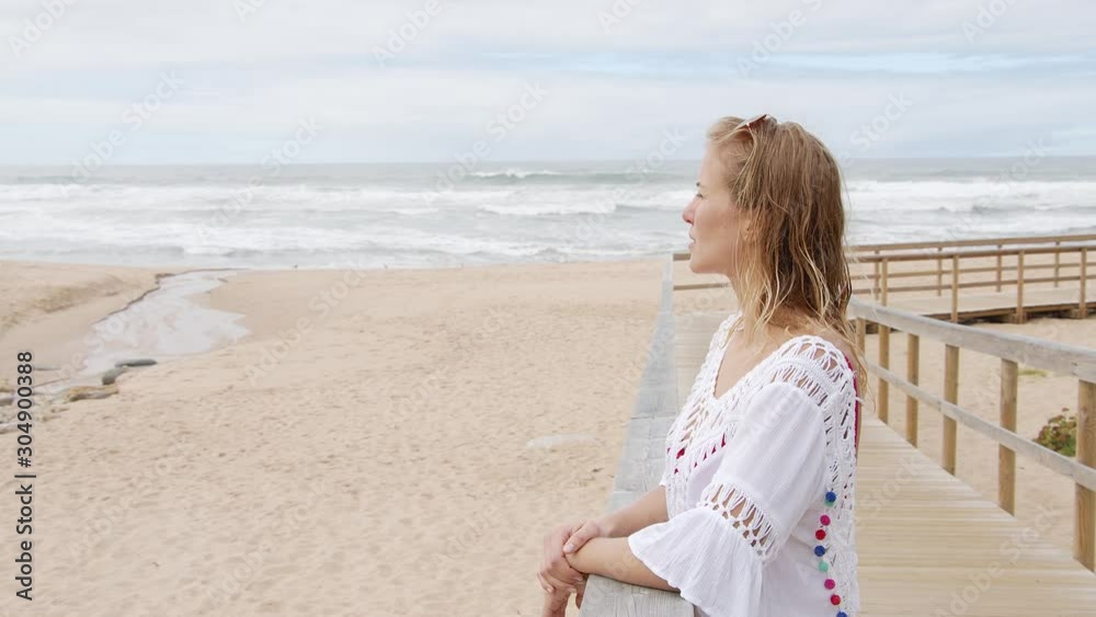 Perfect day in summer - young woman enjoys her day at the beach - travel photography Perfect day in summer - young woman enjoys her day at the beach - travel photography