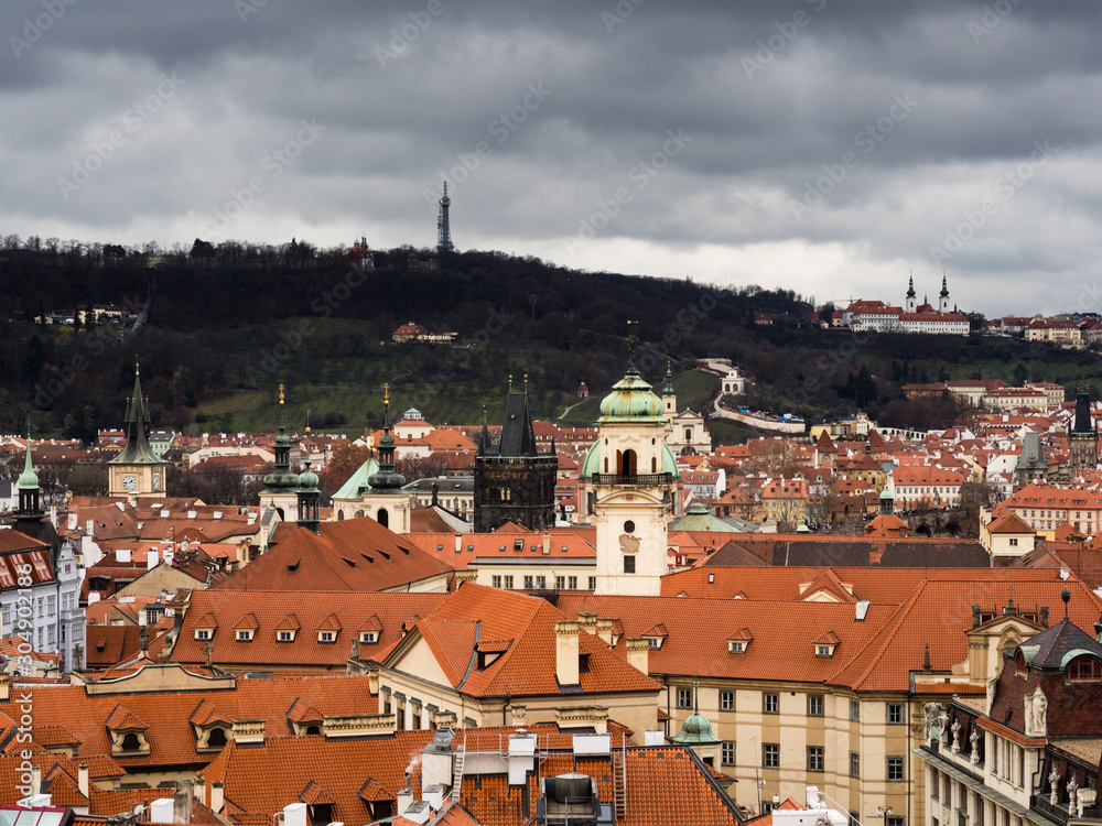 Panoramic view of Prague Old Town rooftops on a gloomy winter day - view from Old Town Hall Tower