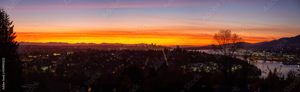 Burnaby, Greater Vancouver, British Columbia, Canada . Beautiful Panoramic View of the city from the top of the hill during a colorful autumn sunset.