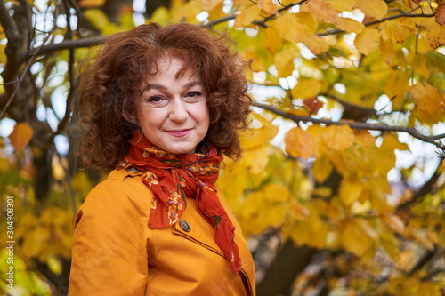 Autumnal portrait of a mature woman