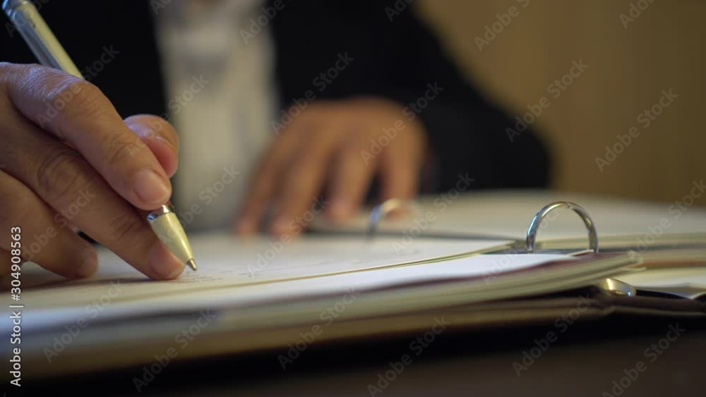 Businessman executive signing contract making deal on official document paperwork files for approval legal finance on management of responsible, signature meeting for startup people concept. 4k