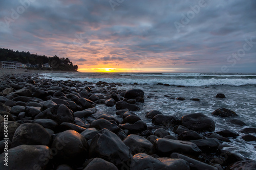 Seaside, Oregon Coast, United States of America. Beautiful View of a Rocky Beach on the Pacific Ocean during a dramatic summer sunset. © edb3_16