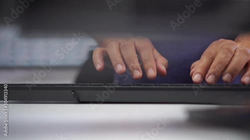 Paperwork files searching information business concept, Businessman hands typing keyboard computer, working in stacks of report papers and piles of unfinished documents achieves on office desk