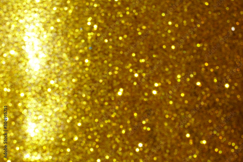 gold Sparkling Lights Festive background with texture. Abstract Christmas twinkled bright bokeh defocused and Falling stars. Winter Card or invitation gold Sparkling Lights Festive background with texture. Abstract Christmas twinkled bright bokeh defocused and Falling stars. Winter Card or invitation