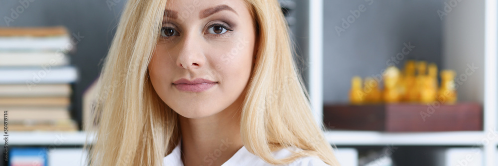 Beautiful smiling businesswoman portrait at workplace Beautiful smiling businesswoman portrait at workplace